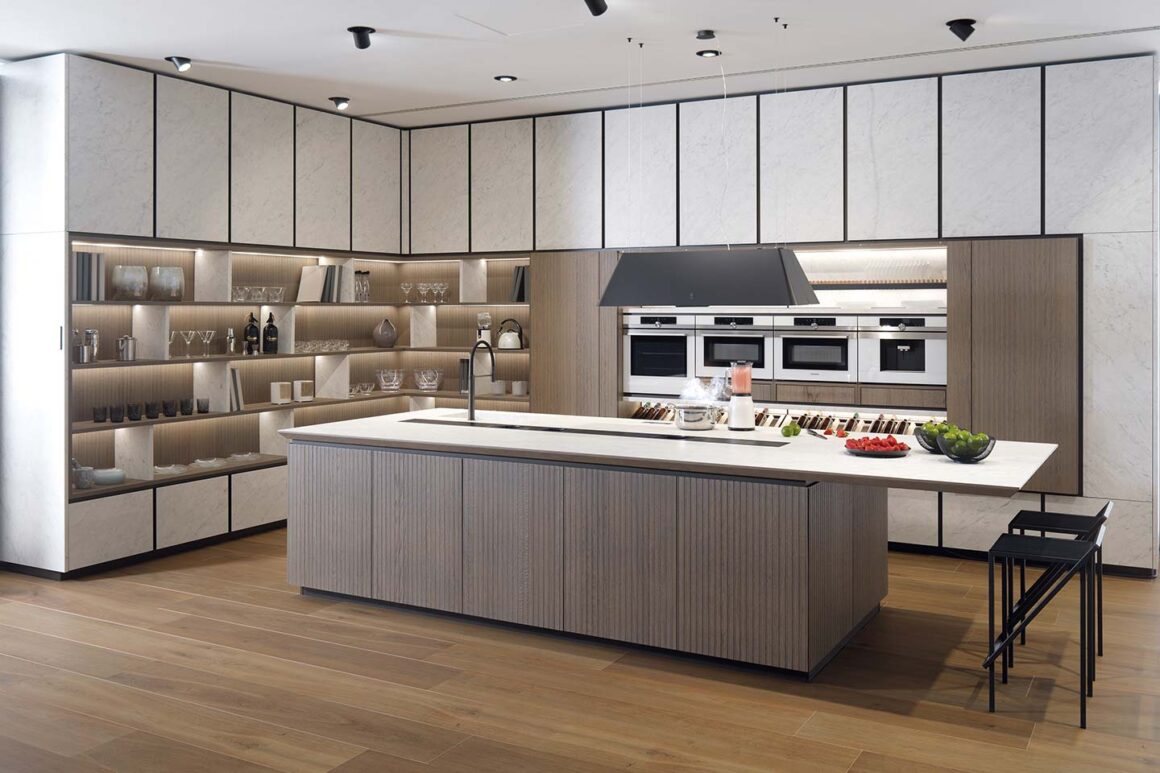 cucina a isola con sistema cottura a induzione invisibile