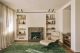 zona relax in soggiorno con poltrona lounge di Charles & Ray Eames