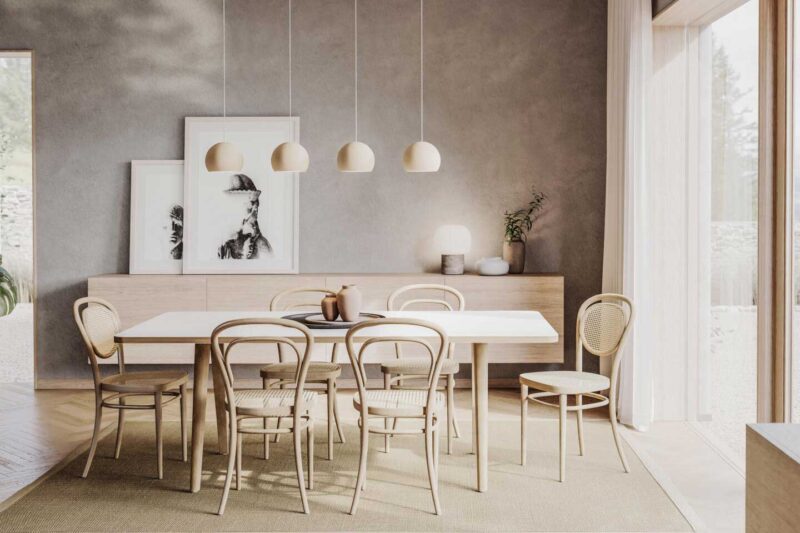 La Paglia di Vienna: dal passato al futuro tra moda e design tavolo con sedie in legno e paglia di vienna
