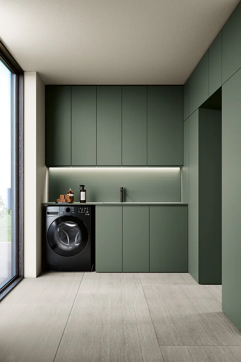Lavanderia moderna con mobili verde salvia, esempio di tendenze bagno 2026